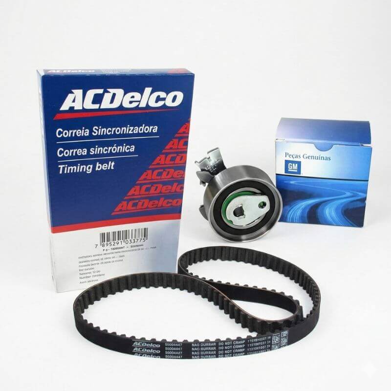 Kit de correia sincronizadora ACDelco e esticador em embalagem original GM Peças Genuínas, exibidos sobre fundo branco em formato quadrado.